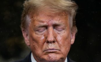 Donald Trump standing quietly in Washington DC