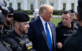 Trump escorted by Secret Service outside White House