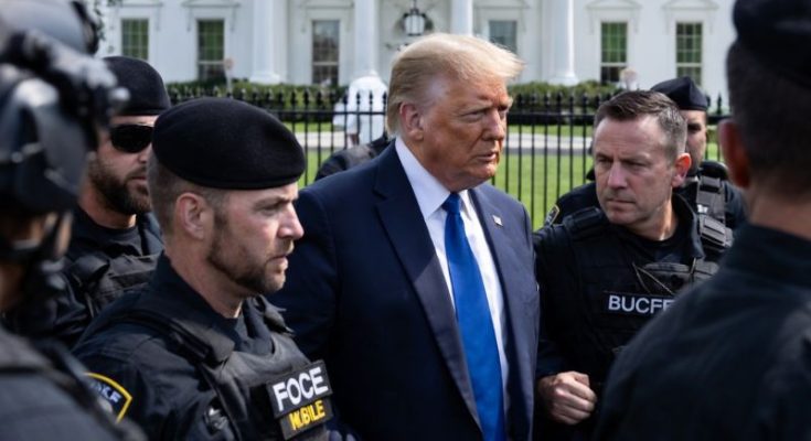 Trump escorted by Secret Service outside White House