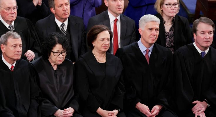 Group of Supreme Court justices seated in formal black robes