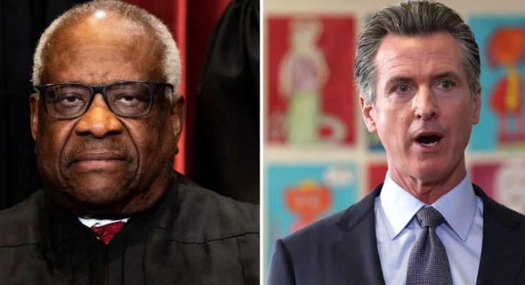 Trump walking with folder outside White House