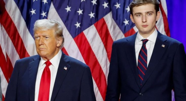 Barron Trump at public event with family