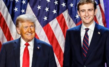 Barron Trump with parents at public event