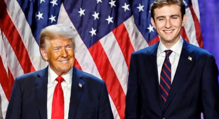 Barron Trump with parents at public event