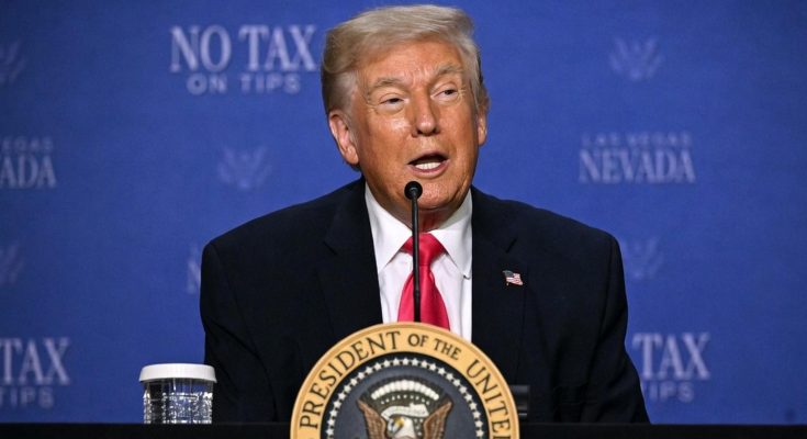 political figure speaking in a news photo