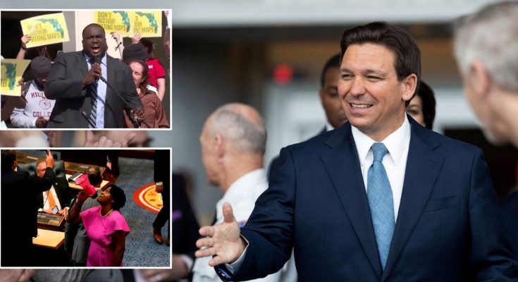 politician greeting supporters amid voting map protests