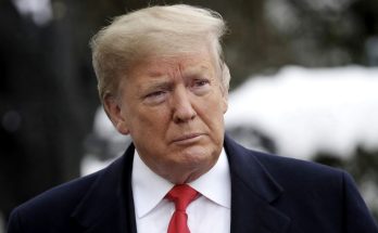 donald Trump with somber expression beneath headline announcing death of top official