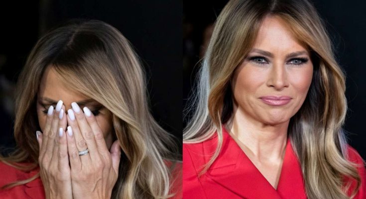melania Trump wearing a red double-breasted coat, shown covering her face with manicured