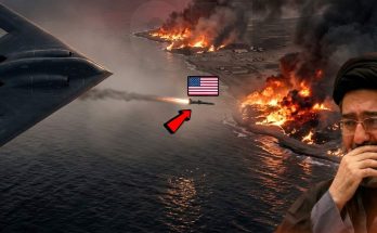 military aircraft over burning coastline with concerned man observing
