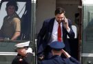 JD Vance exits Marine One helicopter while on phone call as uniformed Marines salute