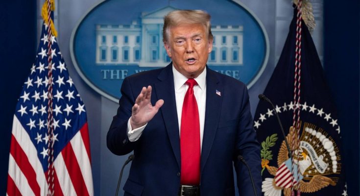 political figure speaking in a news photo