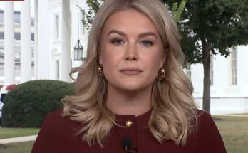 karoline Leavitt speaking at White House press briefing with columns visible behind her
