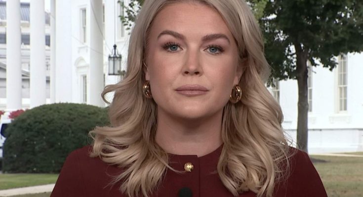 karoline Leavitt speaking at White House press briefing with columns visible behind her