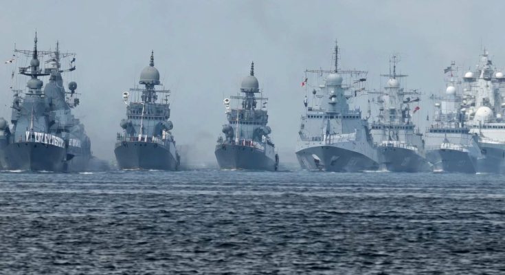 naval fleet in formation at sea during maritime exercise