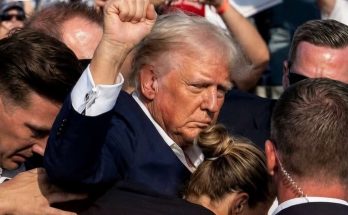 donald Trump surrounded by Secret Service agents with raised fist at rally, inset photo
