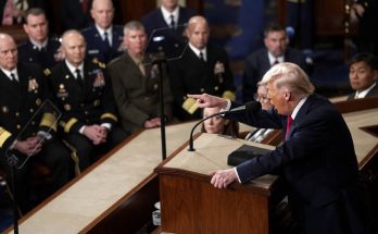 president addresses military leaders in formal setting, serious tone