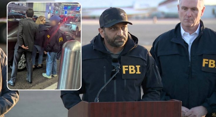 political figure speaking in a news photo