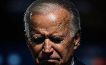 political figure speaking in a news photo