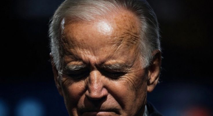 political figure speaking in a news photo