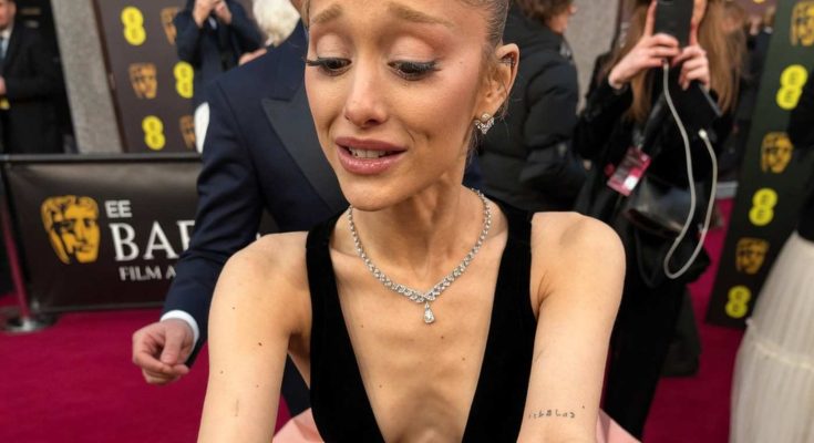 glamorous woman on red carpet at BAFTA Awards event