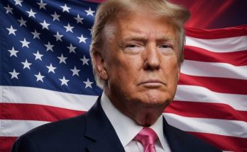 donald Trump in dark suit with pink tie against American flag backdrop with ABC News