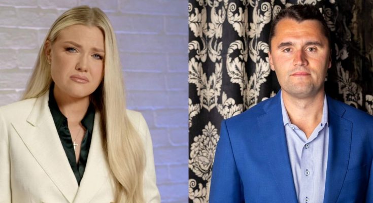 blonde woman in cream suit at clear podium beside man in blue blazer against ornate black