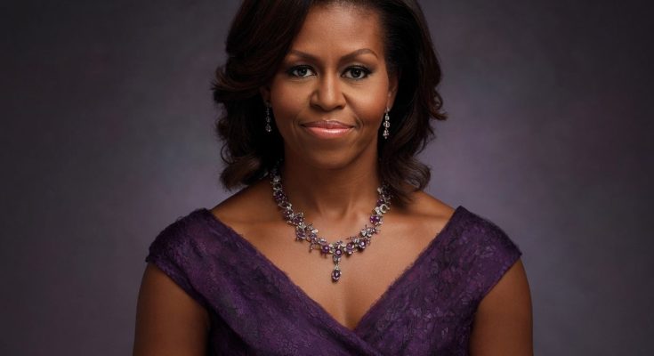 elegant woman in purple dress with necklace, studio portrait
