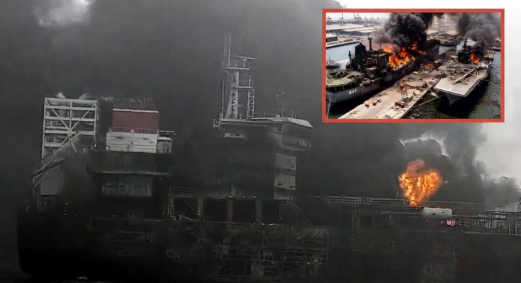 burning warship with thick smoke at shipyard, naval disaster unfolding