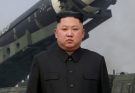 kim Jong Un stands before Hwasong-15 intercontinental ballistic missile on mobile launcher