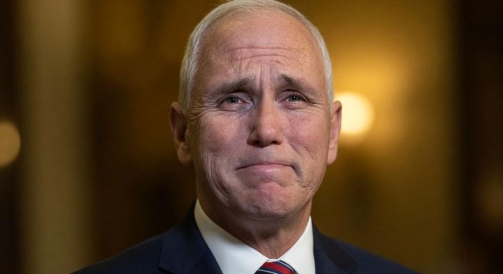 political figure speaking in a news photo