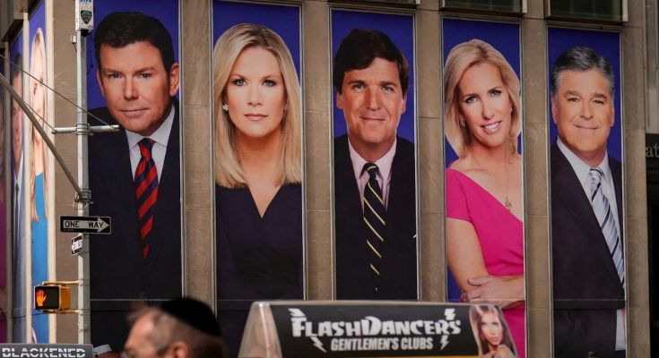 news anchors' portraits on building facade, New York City street