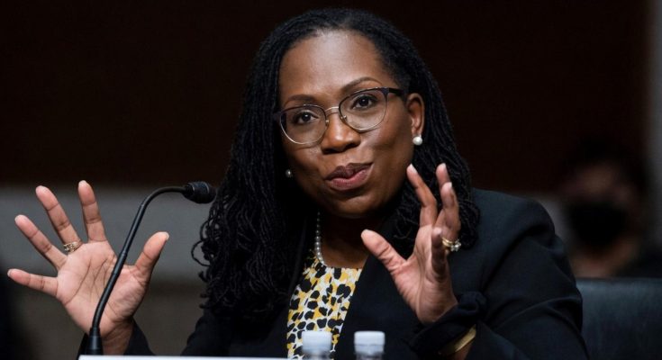 political figure speaking in a news photo