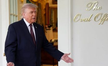 donald Trump gestures with open hands outside The Oval Office door with headline about